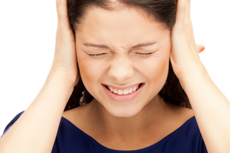 a woman wonders what is causing the popping noise in her ears
