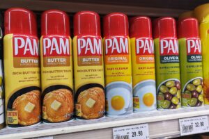 a row of Pam spray cans in the market