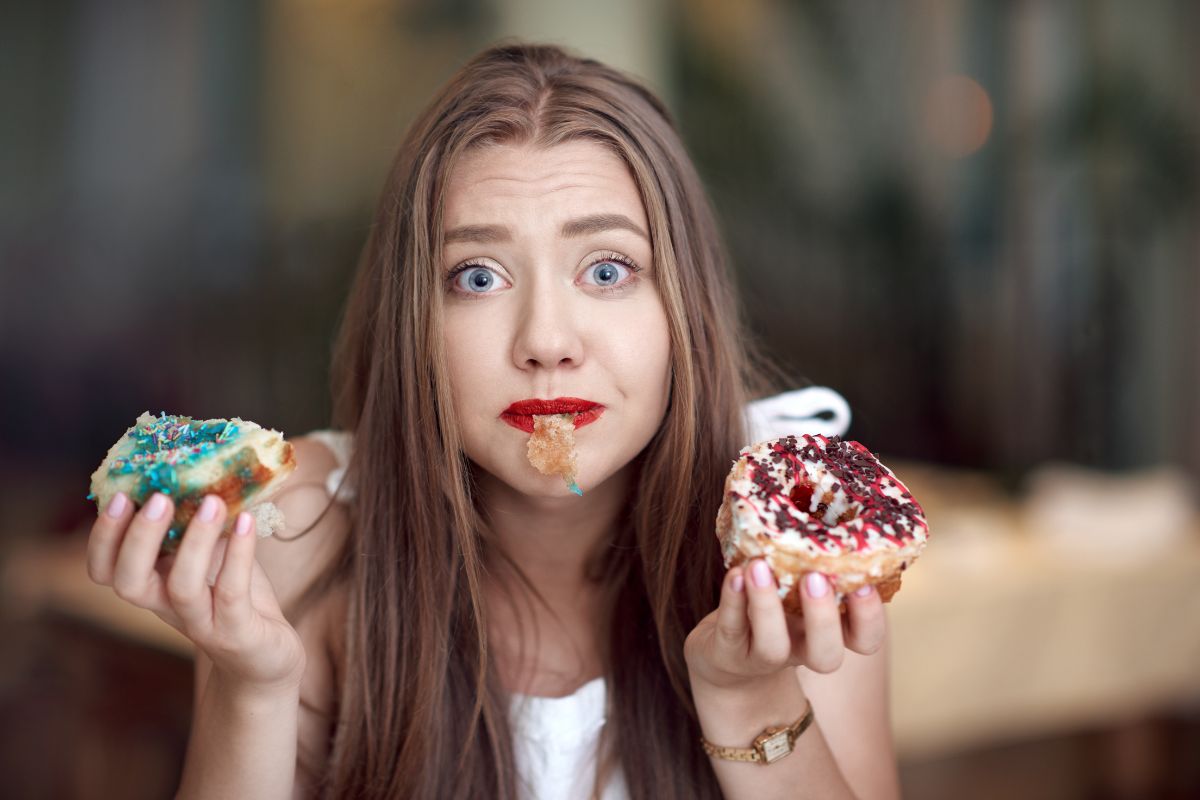 a woman eats a snack